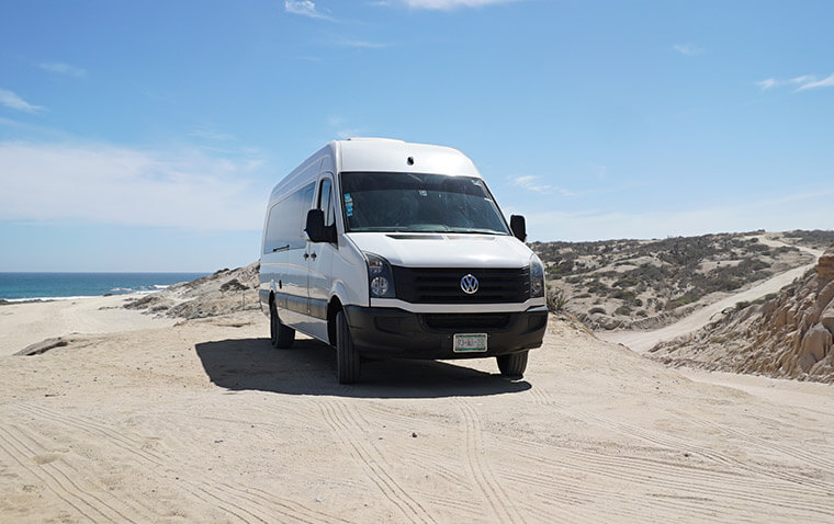 Van on the beach transportation services | Cabo Concierge